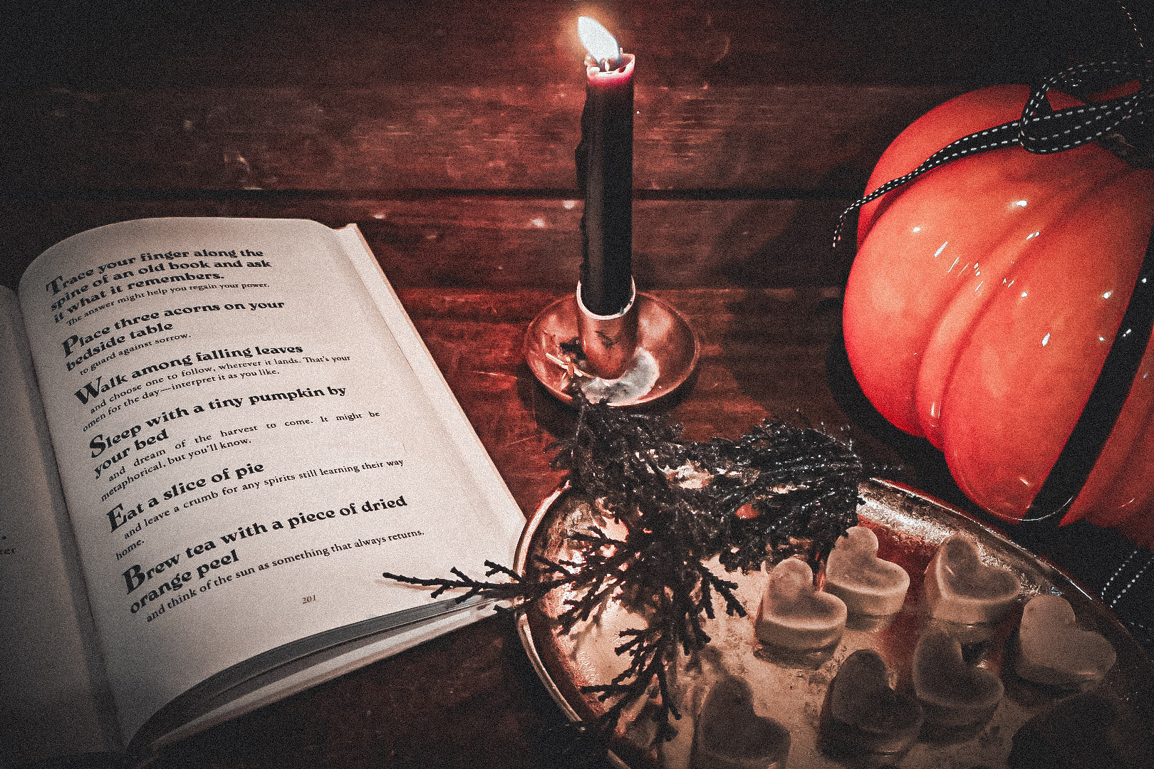 October Fog bath melts with open book, black candle, and decorative pumpkin